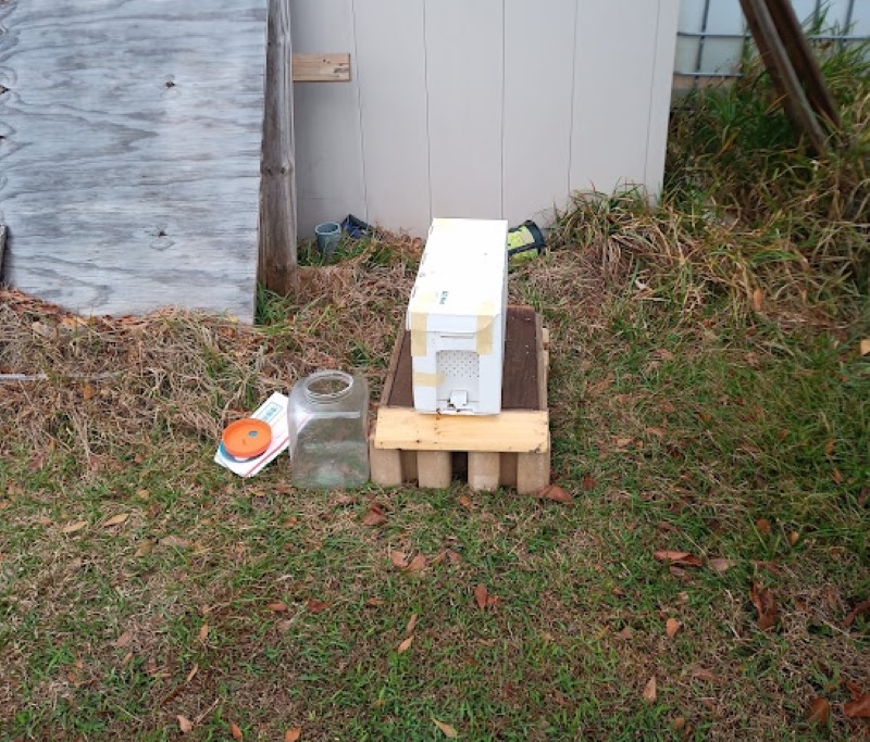 ez pro nuc on a stand in a bee yard